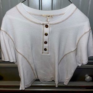 boutique cream top with buttons. ALL MONEY GOES TO ST JUDE!!!